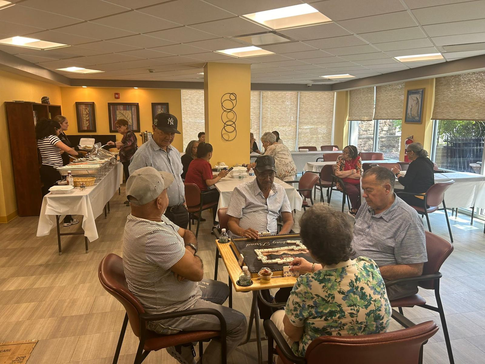 BDC members and Region Nine seniors gathered around tournament tables